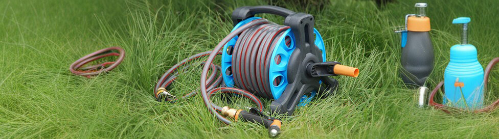 A garden hose reel on the lawn