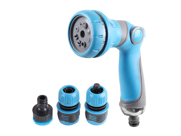 A blue garden water spray gun and three different styles of replacement accessories