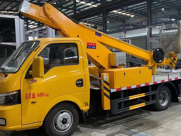 Hose reel on truck mounted crane