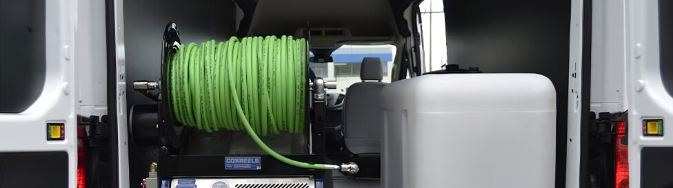 UHP water hose reel on a cleaning truck